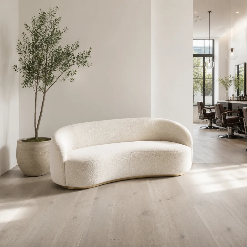 Boucle lounge sofa and olive tree